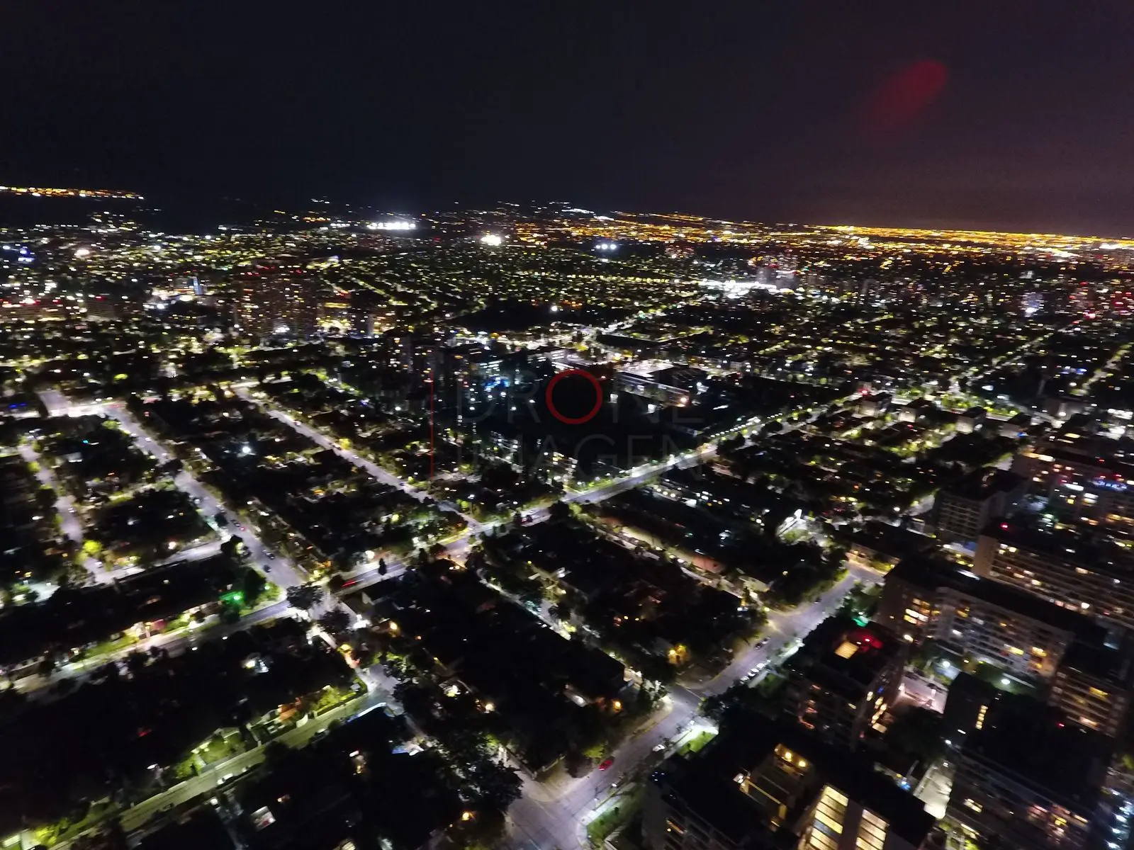 Luces de la ciudad extendidas, Las Condes · vista aérea oblicua